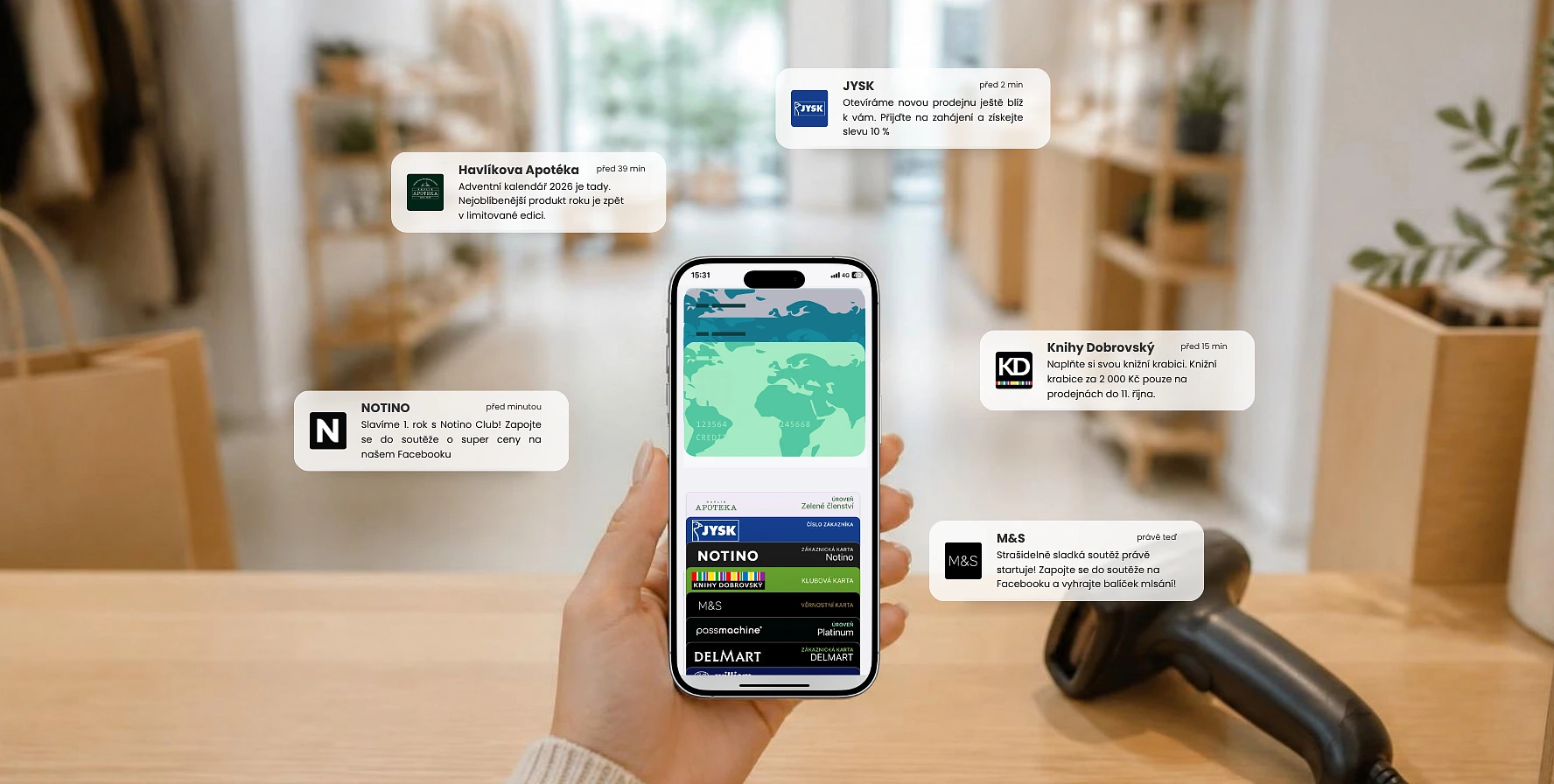 Hand holding a smartphone with digital loyalty cards in Apple Wallet against a store background with brand notifications.